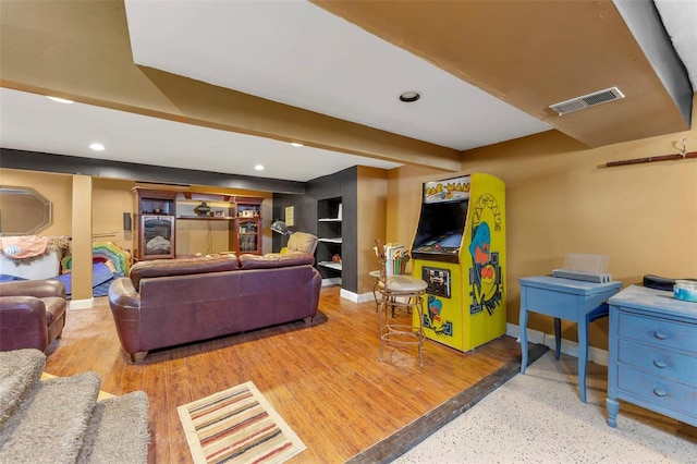 living room with light hardwood / wood-style flooring