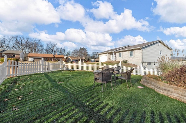 view of yard with a garage