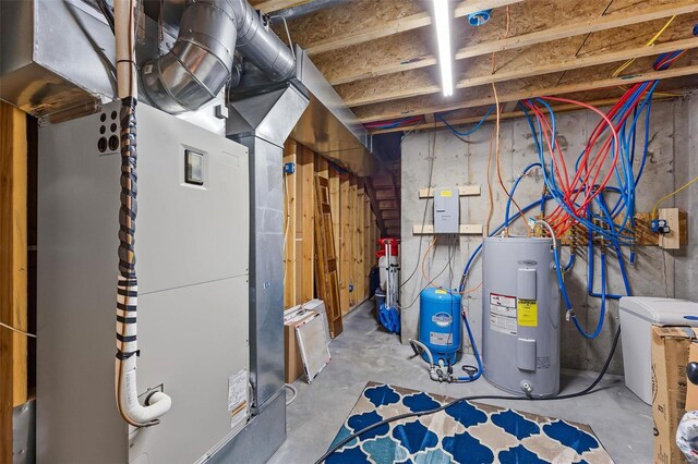 utility room featuring heating unit and water heater