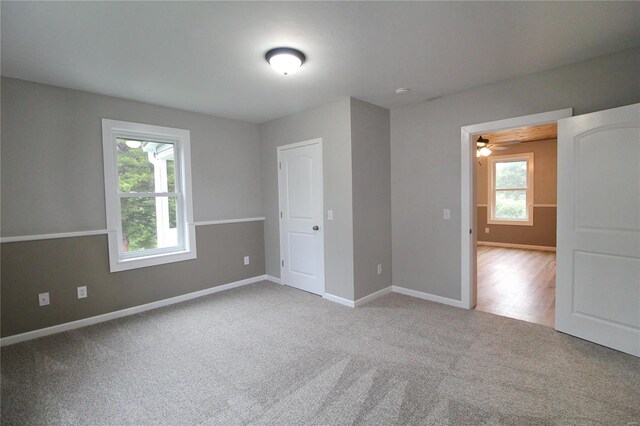 unfurnished bedroom featuring carpet floors