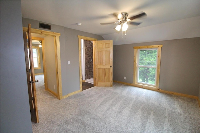 unfurnished bedroom with carpet floors and ceiling fan