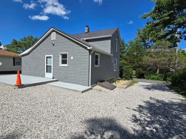 rear view of property with a patio