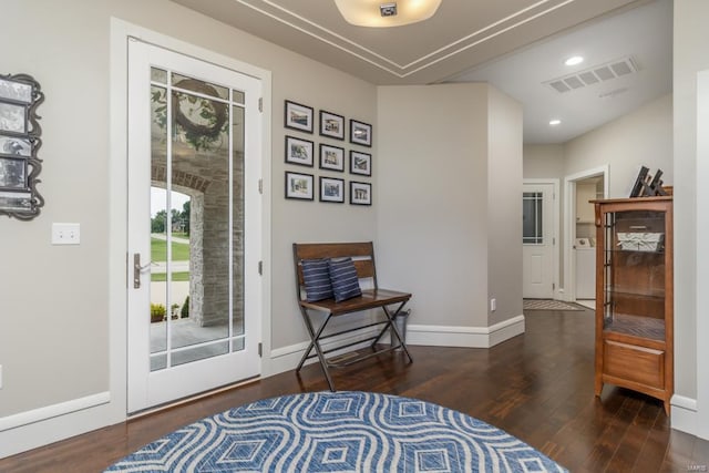 interior space with washer / clothes dryer and dark hardwood / wood-style floors