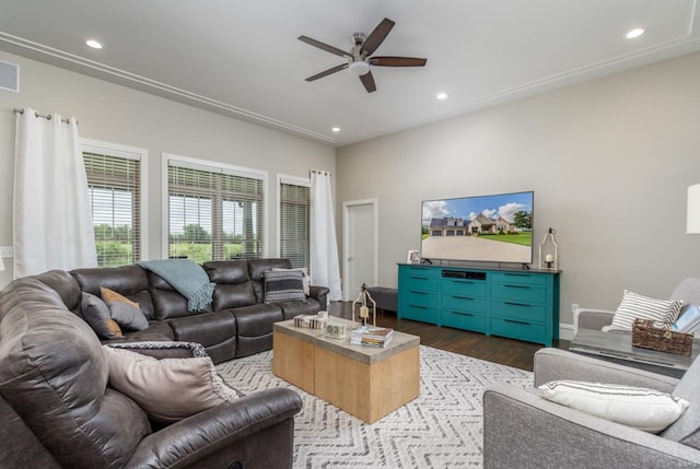 living room featuring ceiling fan and dark wood-type flooring