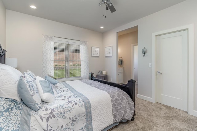 bedroom with light carpet and ceiling fan