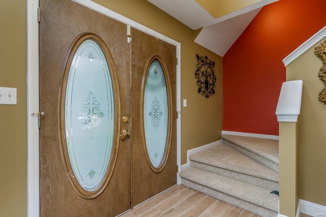 foyer entrance featuring wood-type flooring