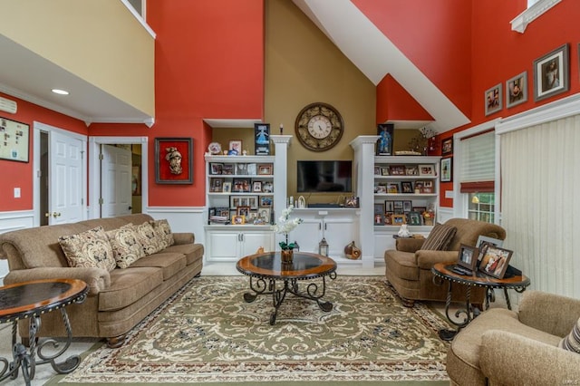 living room with a towering ceiling