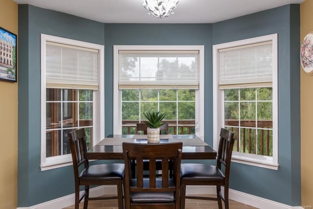 dining area with a notable chandelier