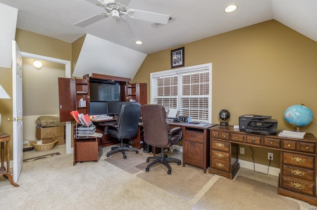 carpeted home office featuring ceiling fan and lofted ceiling