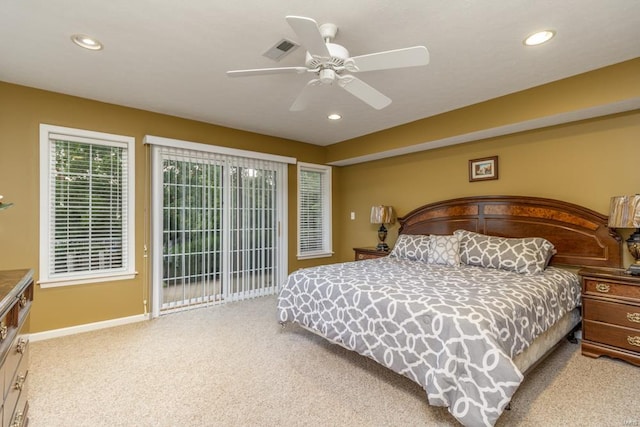 bedroom with access to outside, light colored carpet, and ceiling fan