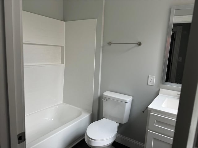 full bathroom featuring shower / bathing tub combination, vanity, and toilet