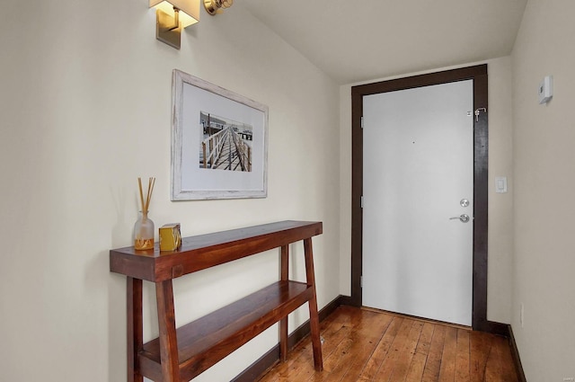 doorway to outside with hardwood / wood-style flooring