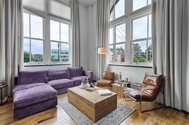 sitting room featuring light hardwood / wood-style floors