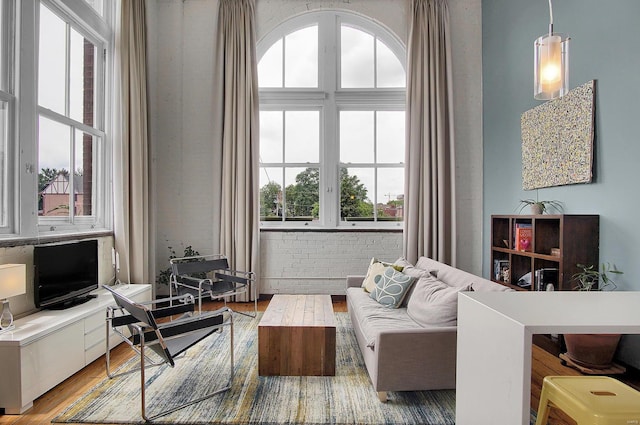 sitting room with hardwood / wood-style floors