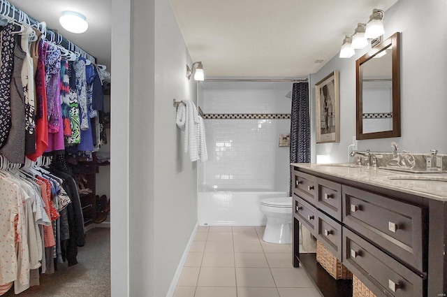 full bathroom featuring tile patterned flooring, vanity, shower / bath combination with curtain, and toilet