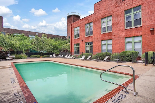 view of swimming pool featuring a patio