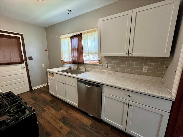 kitchen featuring range with gas cooktop, dishwasher, dark wood-type flooring, white cabinetry, and sink