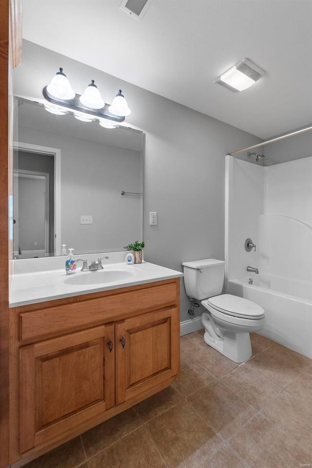 full bathroom with vanity, tub / shower combination, tile patterned flooring, and toilet