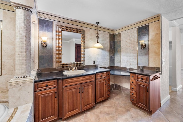 bathroom with tiled tub, tile patterned flooring, crown molding, and tile walls