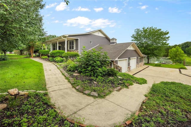 view of home's exterior featuring a garage and a lawn