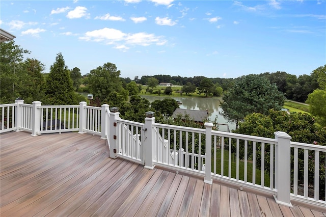 deck featuring a water view