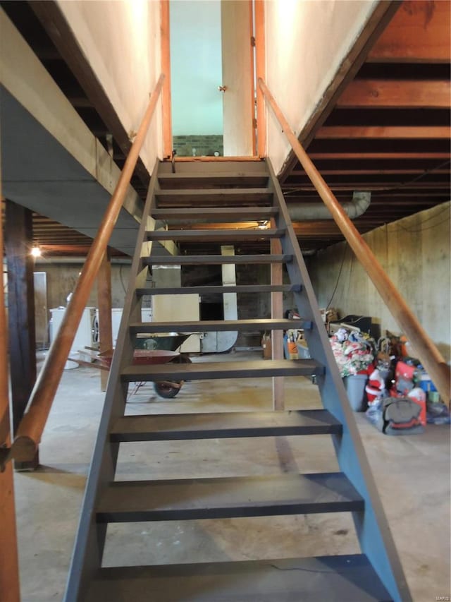 stairs with concrete floors