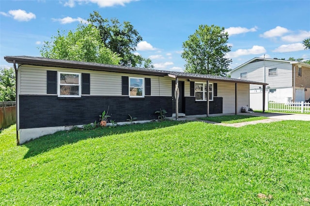 ranch-style home with a front yard