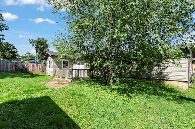 view of yard with a deck