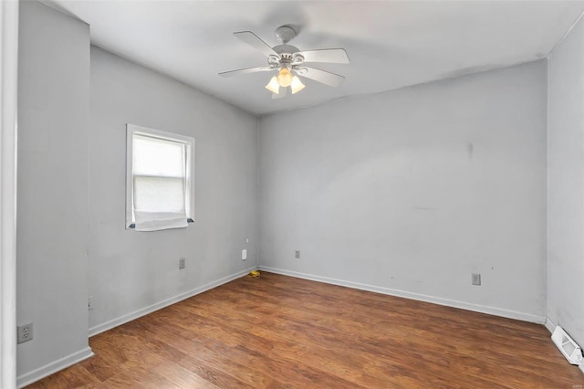 empty room featuring ceiling fan and wood-type flooring