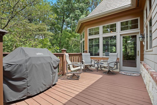 wooden terrace with grilling area