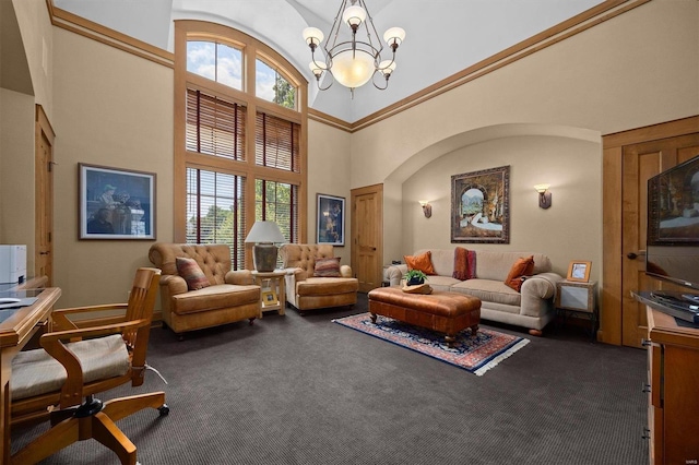 living room with a healthy amount of sunlight, a towering ceiling, and dark carpet