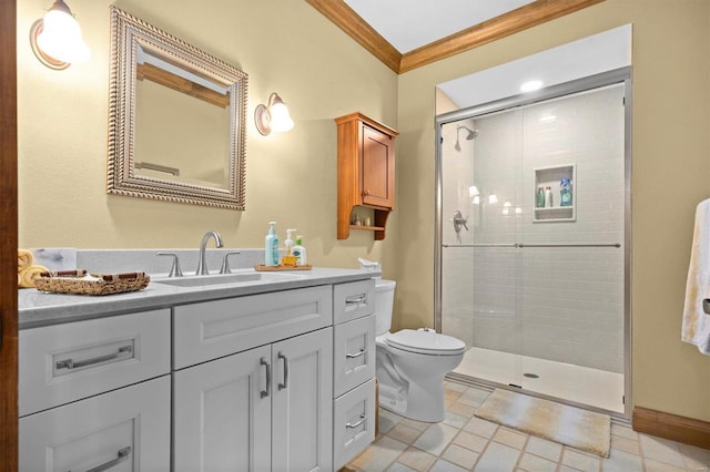 bathroom with crown molding, vanity, toilet, and an enclosed shower