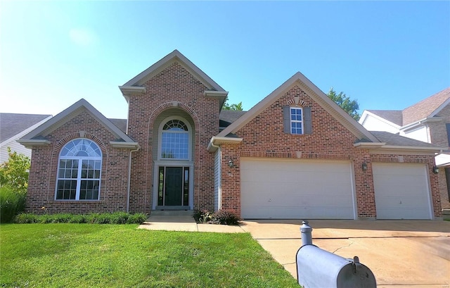 front facade with a garage and a front lawn