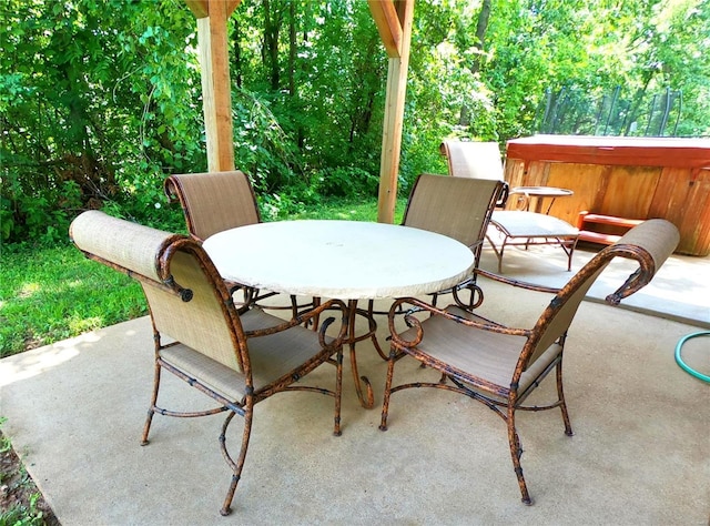 view of patio / terrace featuring a hot tub