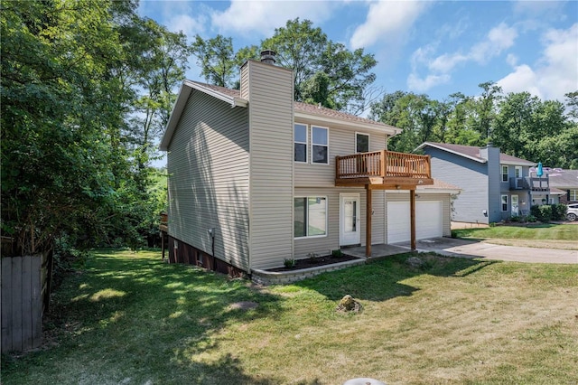 back of house with a lawn