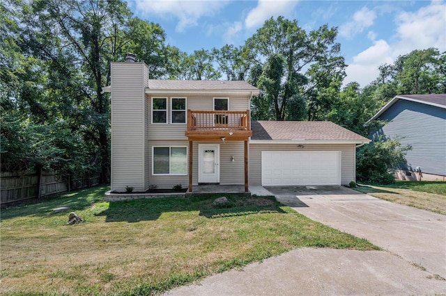 front of property featuring a balcony, a front lawn, and a garage