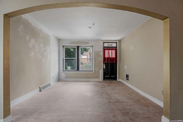 unfurnished living room featuring hardwood / wood-style flooring