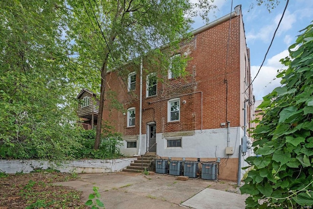 view of building exterior featuring cooling unit