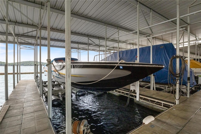 dock area featuring a water view