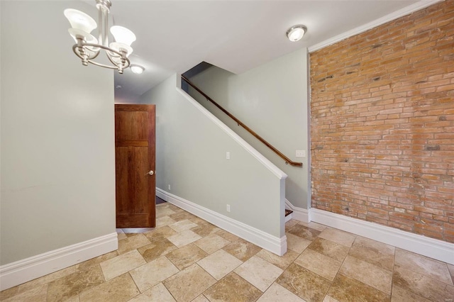 staircase featuring a notable chandelier