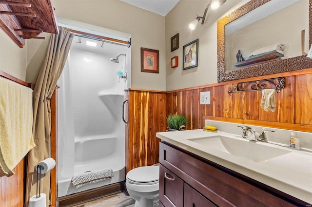 full bathroom with vanity, shower / bathtub combination with curtain, wooden walls, and toilet