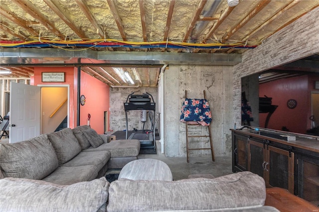 living room with concrete flooring