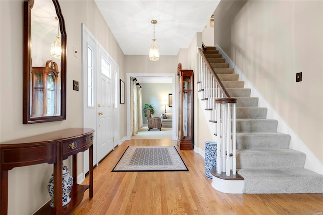 entryway with light hardwood / wood-style flooring