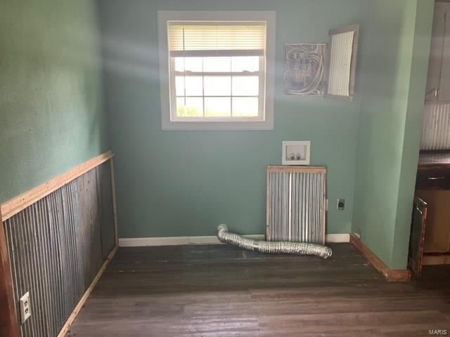 washroom featuring hookup for a washing machine, dark hardwood / wood-style flooring, and hookup for an electric dryer