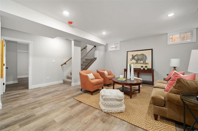 living room with baseboards, stairway, wood finished floors, and recessed lighting