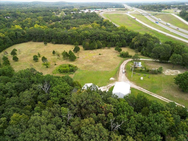 bird's eye view with a rural view and a forest view