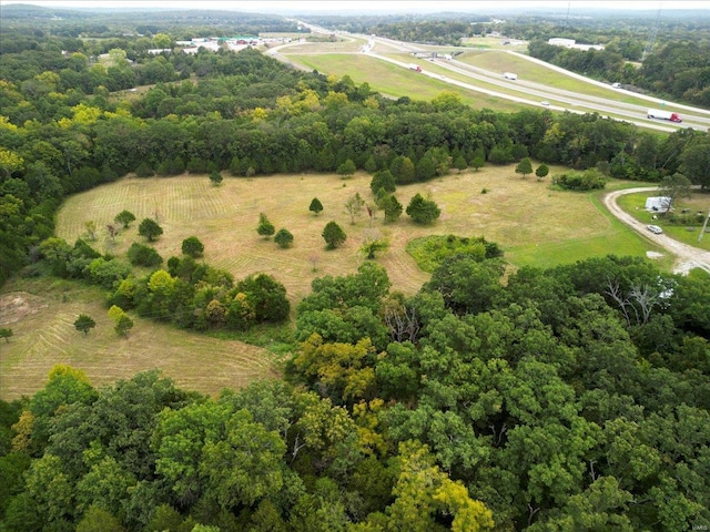 birds eye view of property featuring a rural view