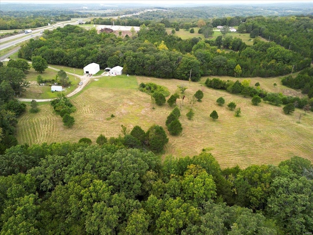 aerial view featuring a rural view and a forest view