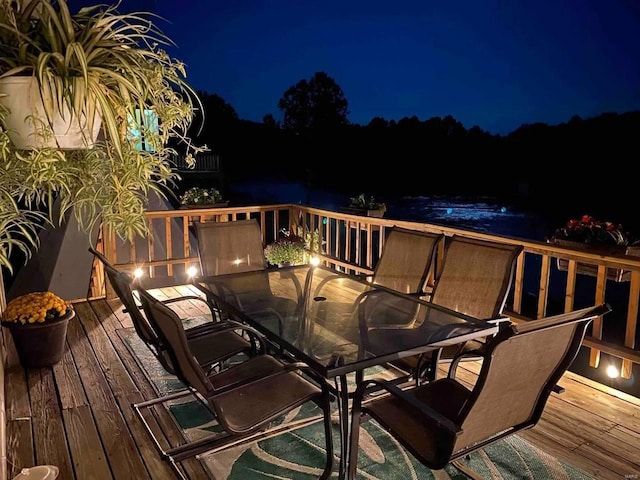 view of deck at twilight