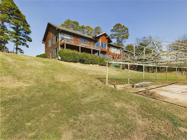 rear view of house with a lawn